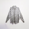 Blusa cielo de lunares